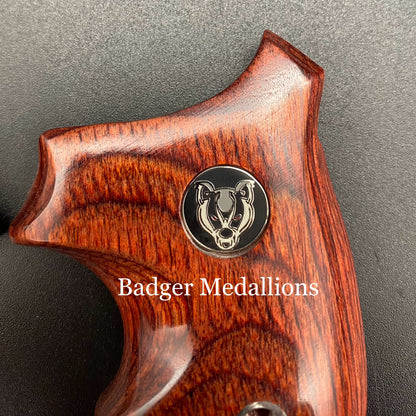 Black white and red Badger Medallion close-up